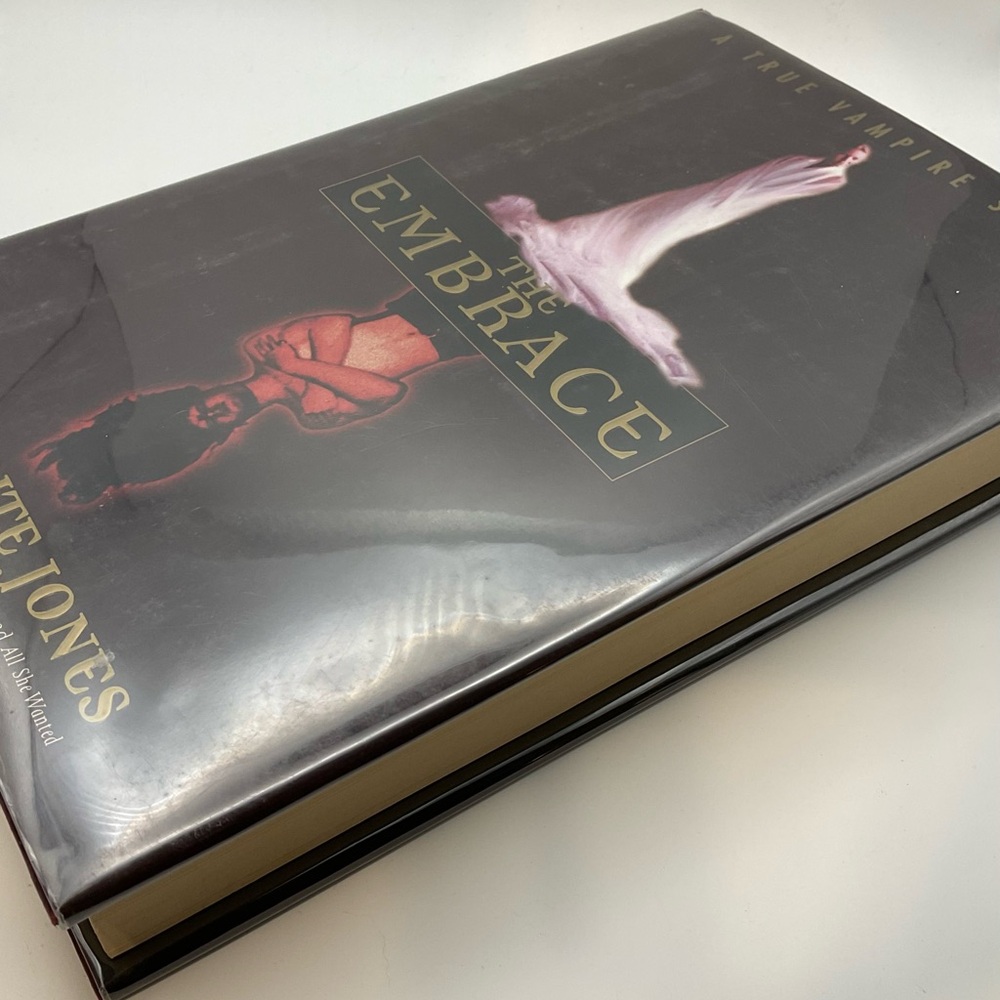 The Embrace Hardcover Book